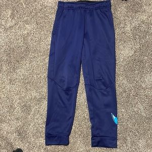 Youth large navy Nike dri-fit pants with light blue logo